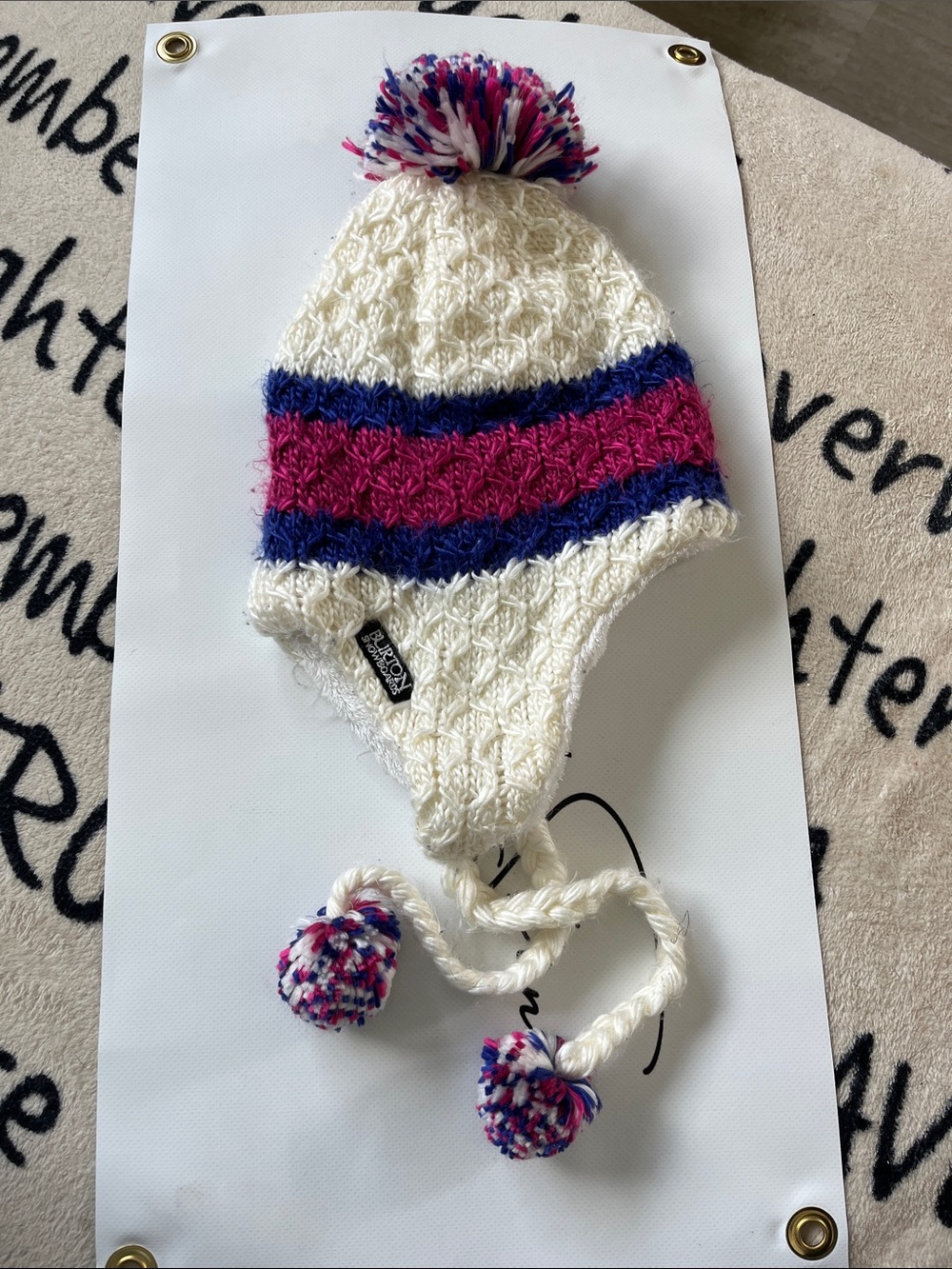 Burton Cream Knit Earflap Hat with Pink & Purple Stripes and Pom